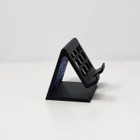 3D printed phone stand with company logo.