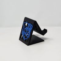 3D printed phone stand with company logo.