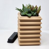 3D printed wall mountable planter.