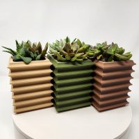 3D printed wall mountable planter.